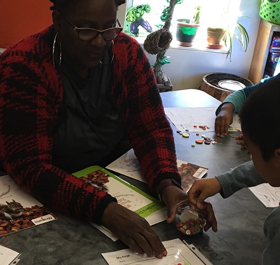 teacher helping kids