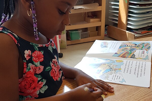 girl doing school work