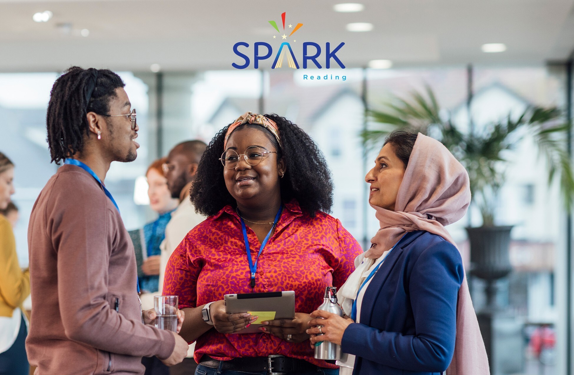spark cover image of three people talking to each other